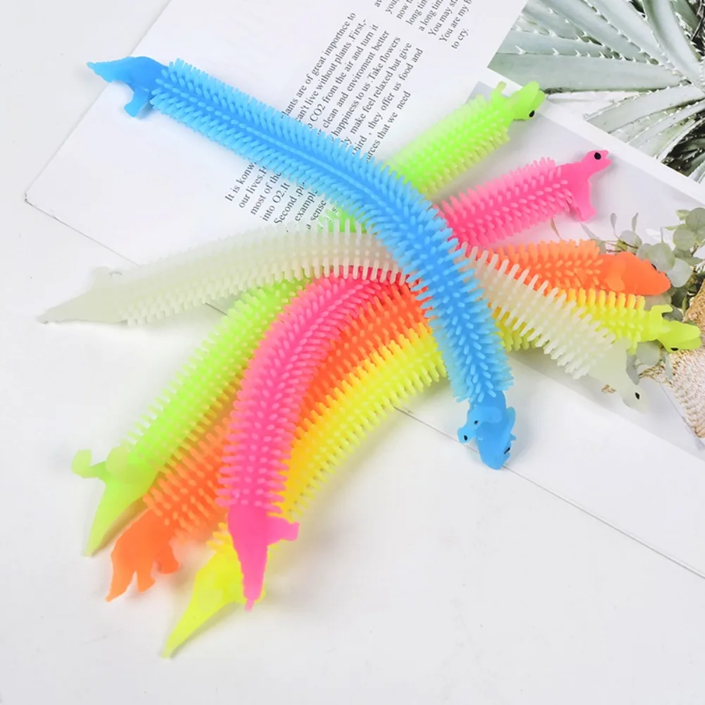 1Pc TPR Glow Dinosaur Pull String Toy. Creative Stretch Hand Ring Pulling Rope. Cartoon Stress Relief Bounce Fidget Toy. - Detail 1