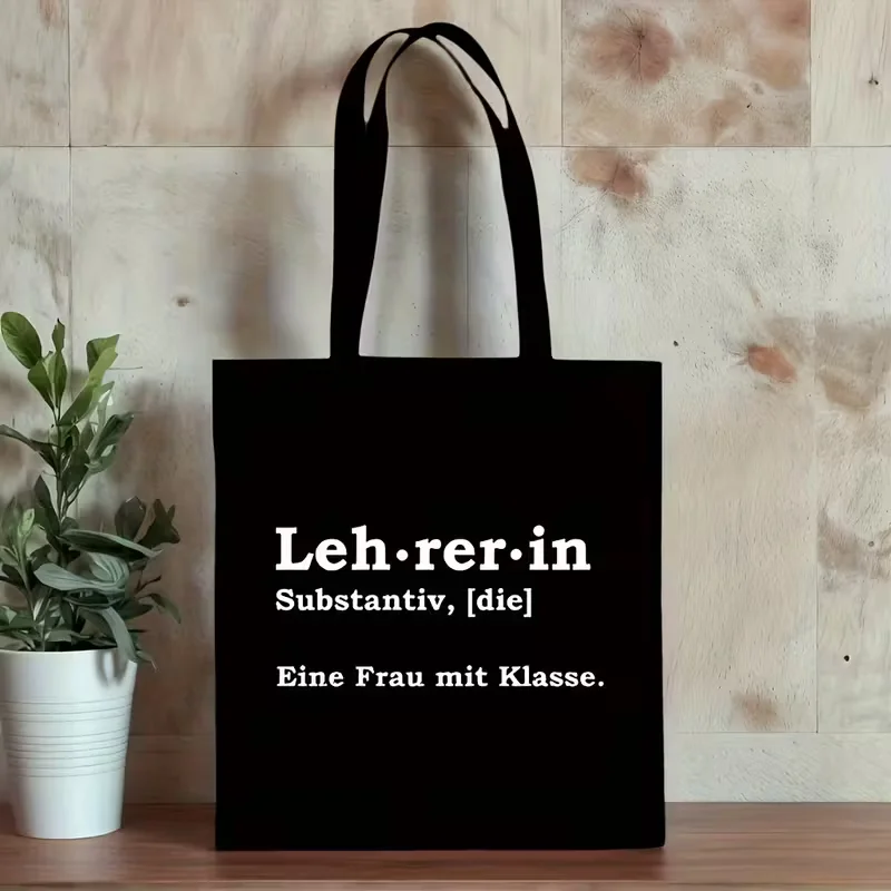 حقيبة حمل بعبارة إسبانية للسيدات من Achu llevo cosas de senora (I Have the Lady's Things) - حقيبة يد باللغة الإسبانية باللون البيج والأحمر