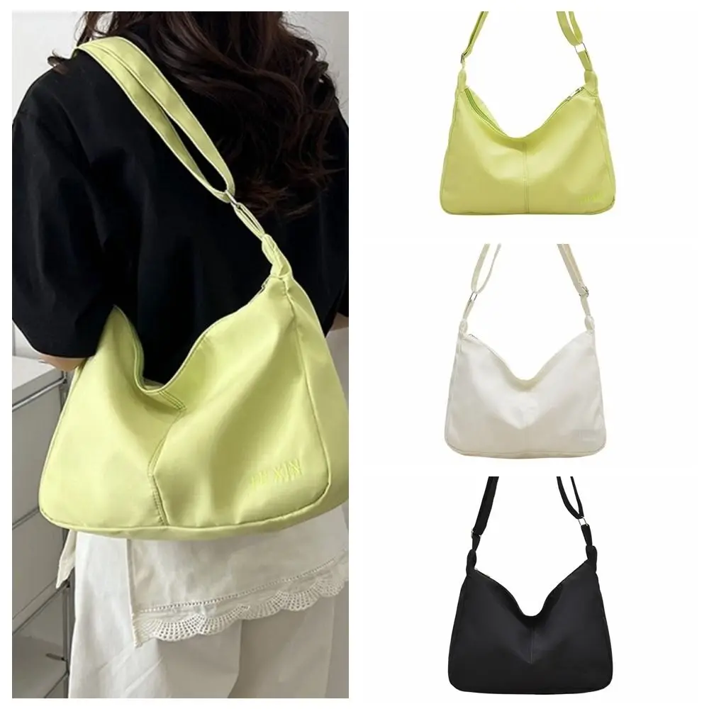 حقيبة كروس كاجوال من القماش ذات سعة كبيرة بلون سادة وسحاب حقيبة كتف خفيفة الوزن للفتيات