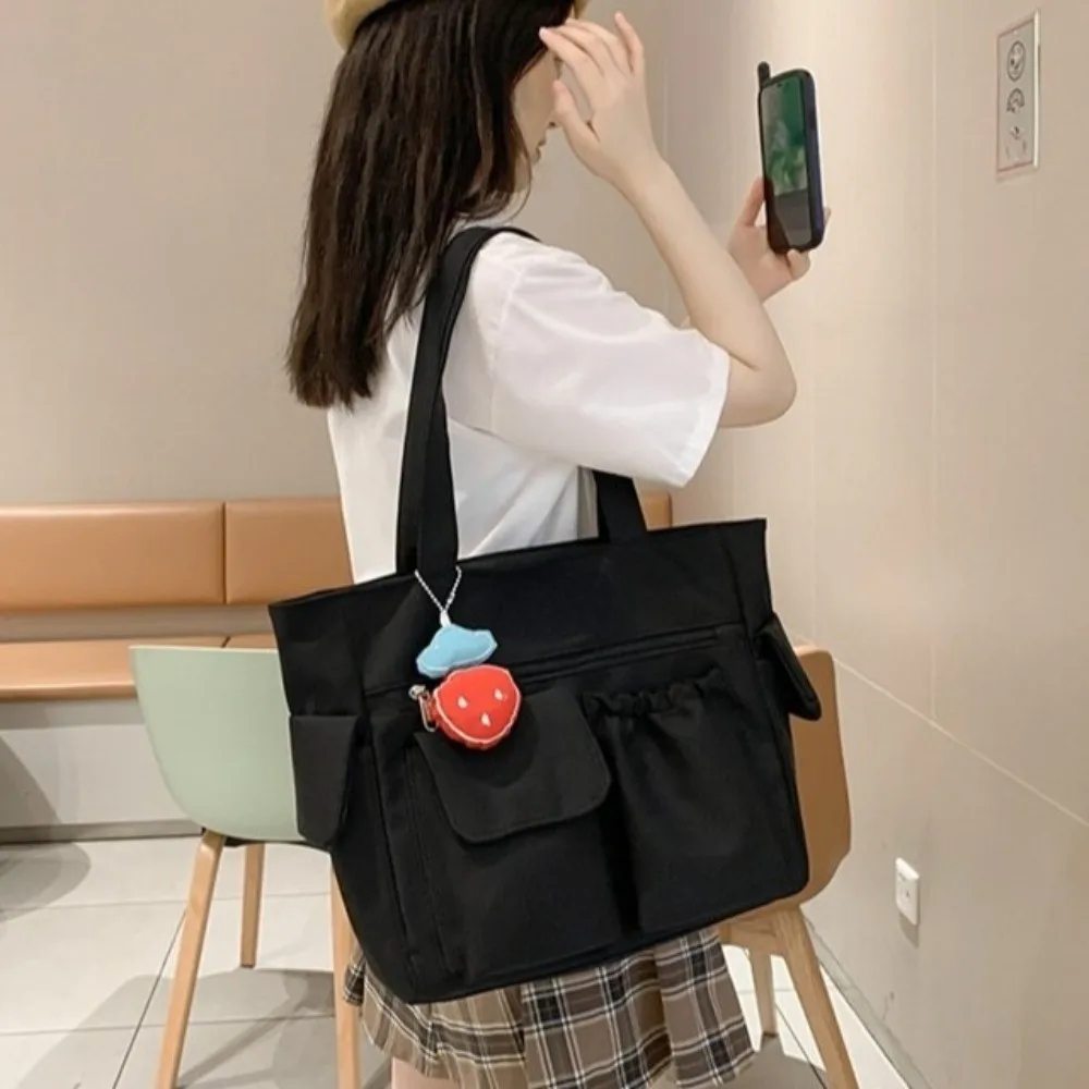 

Nylon Canvas Tote Bag Solid Color with Strawberry Pendant Student School Bag Handbag Korean Style Japanese Shoulder Bag Daily
