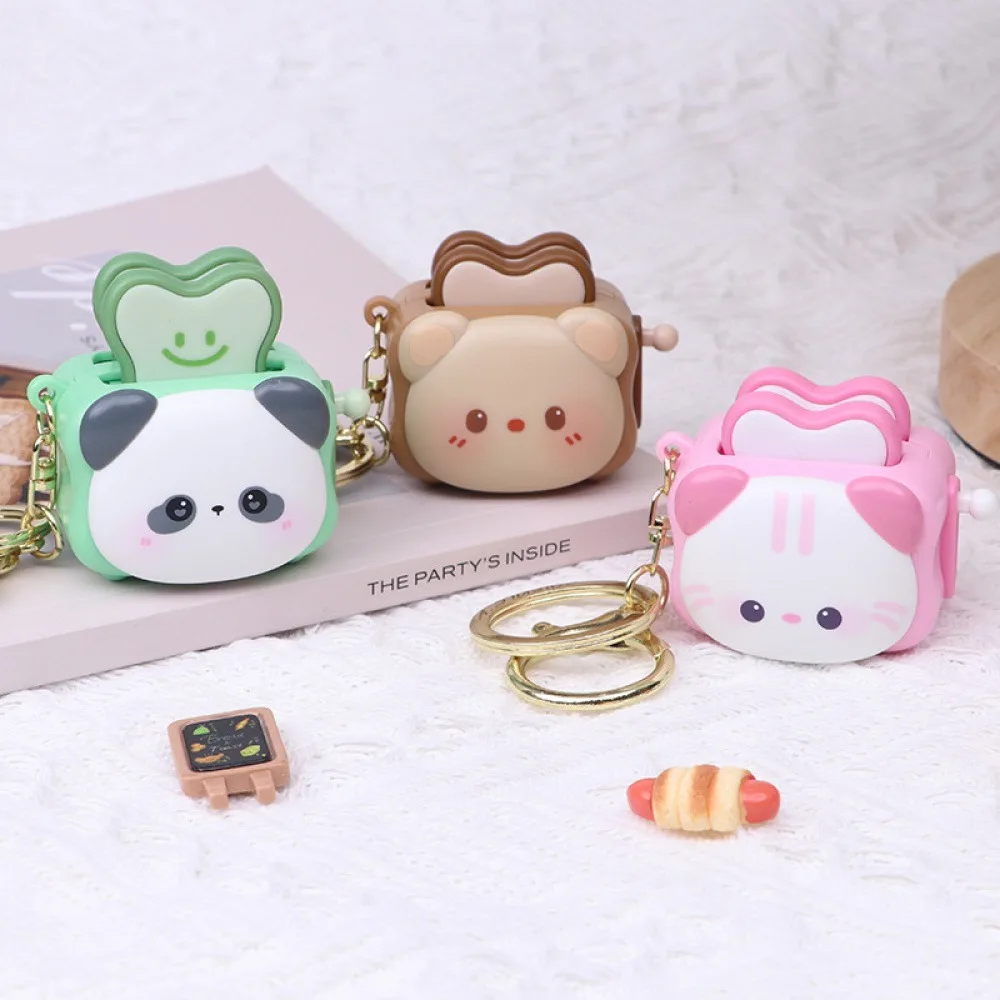 Cartoon animal-shaped fun hand-cranked toast pendant, student bag decoration, stress-relief toaster keychain, bag accessory image 5