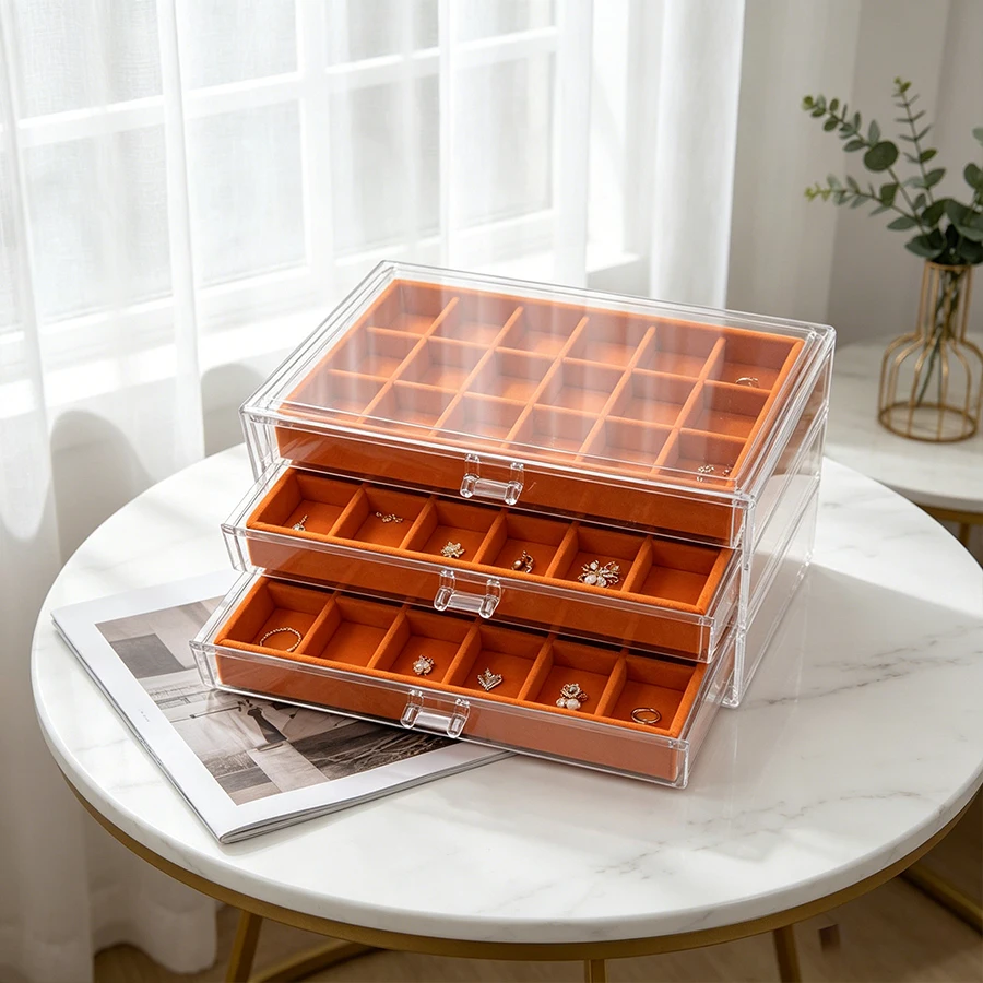 Orange jewelry box with multiple layers. High-end jewelry storage box for rings, necklaces, earrings and pendants. Display box f