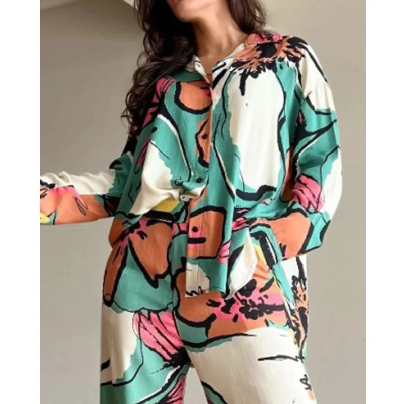 Abito da donna con stampa pendolare alla moda 2025 Autunno Nuovo stile Risvolto Camicia ampia a maniche lunghe Vita alta Pantaloni a gamba larga Set a due pezzi