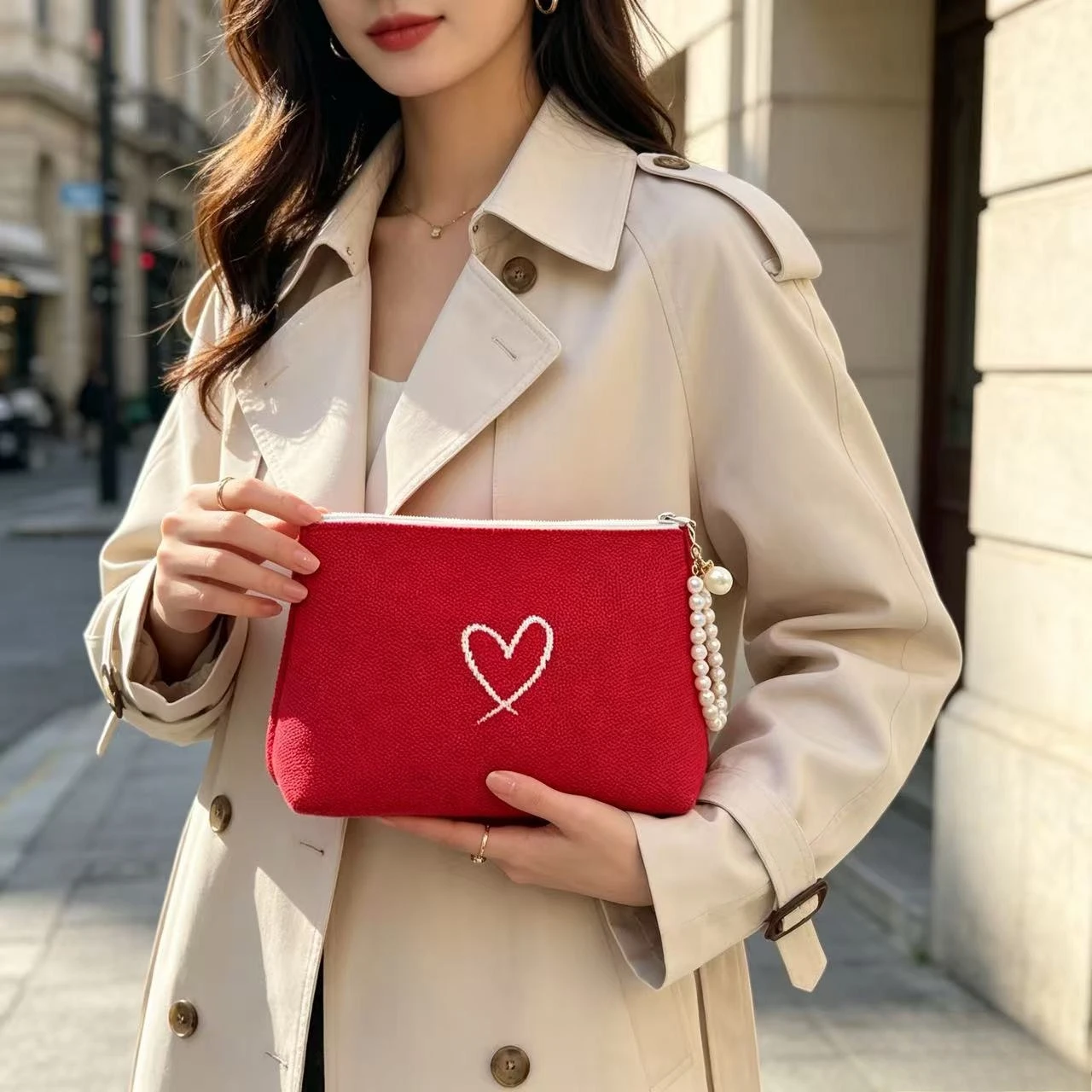 New knitted atmospheric bright color woven heart clutch bag light luxury pearl zipper pull travel portable miscellaneous storage