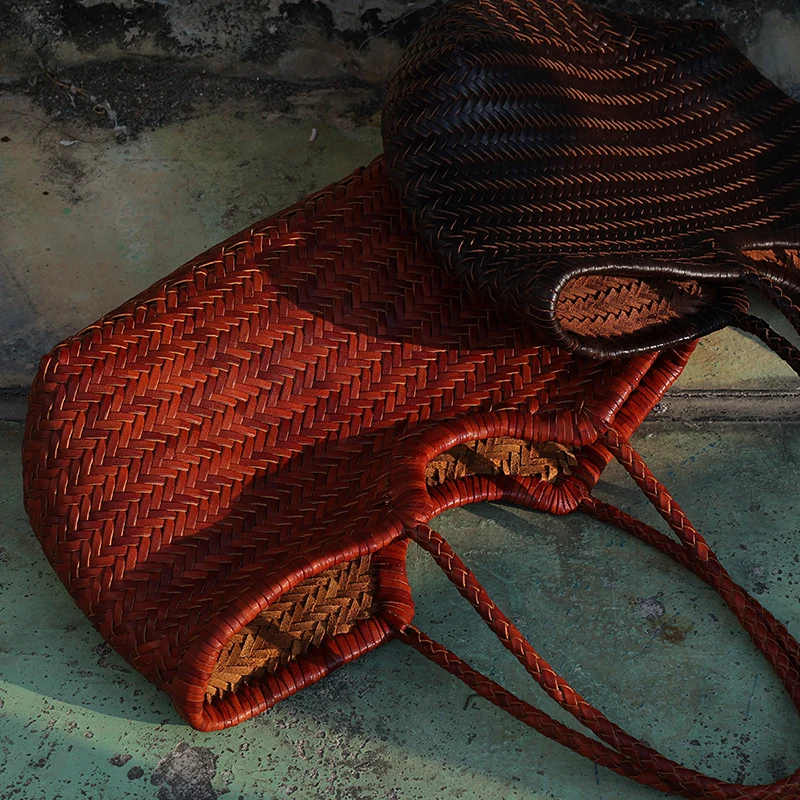 Bolso tipo cesta de piel de vaca francesa tejida para primavera y verano, bolso tejido de ratán, bolso retro informal de moda de gran capacidad para mujer