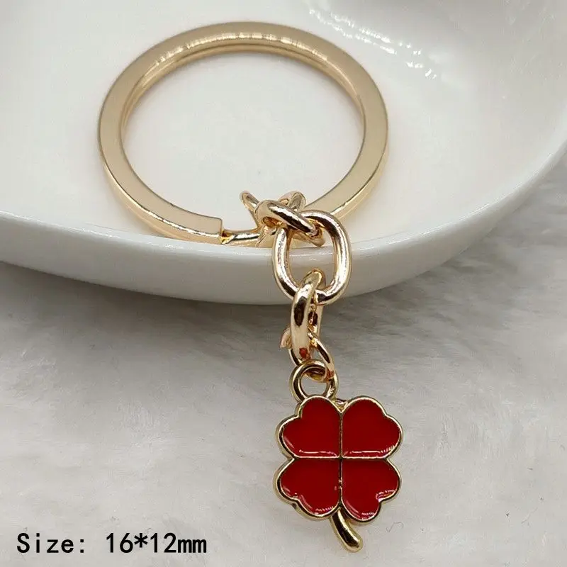 Creative multi-color enamel Four-leaf clover lucky key chain pendant bag accessories girl key chain Christmas gift sales