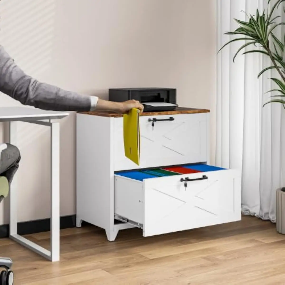 Two-drawer lateral steel filing cabinet with synchronized lock system and anti-tip interlock mechanism — accommodates A4 letter