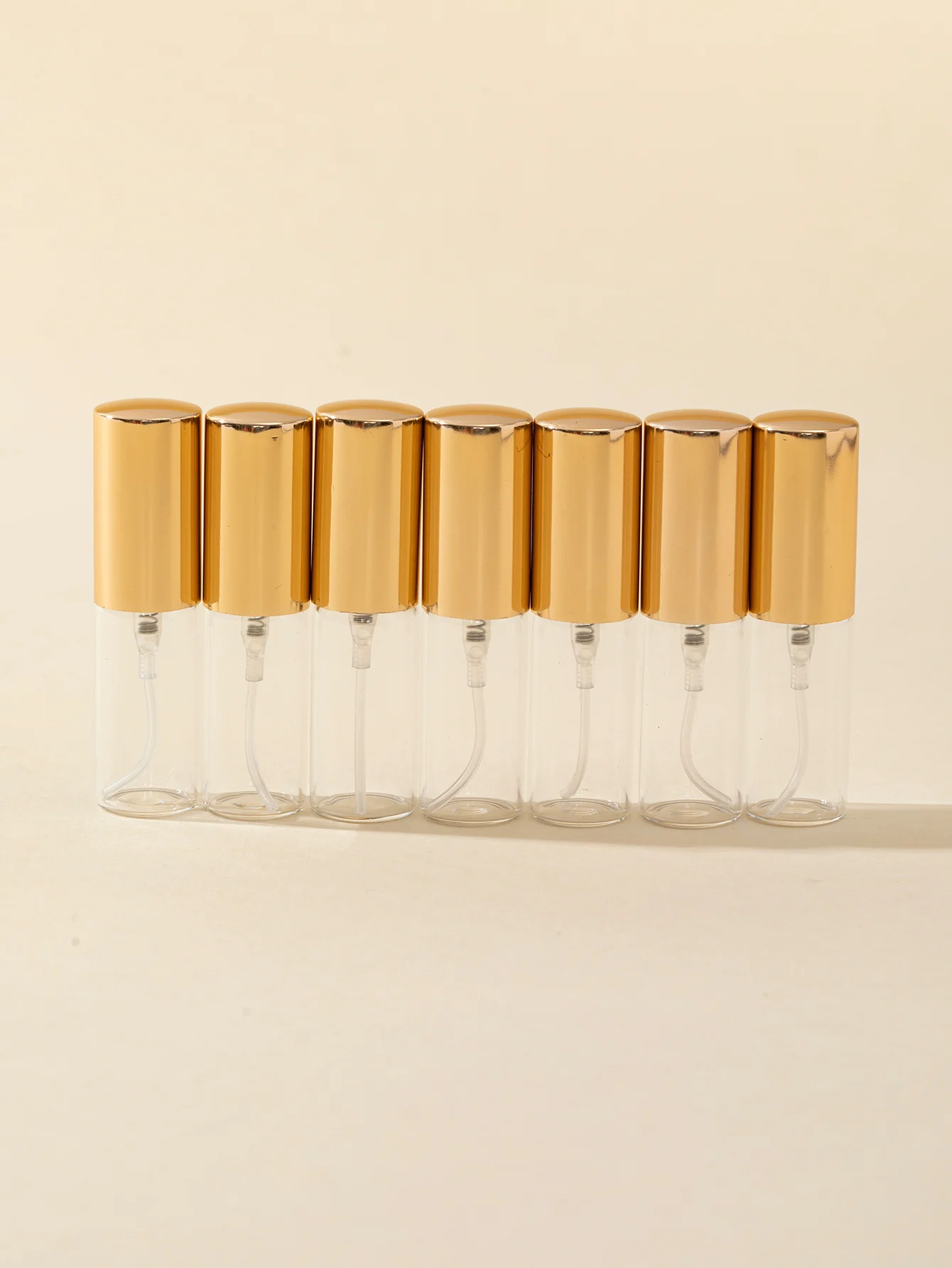 Groothandel 35/stuk 5ml10ml15ml lokale tiran goud transparant glas verdikte spuitfles mini parfumflesje reisformaat