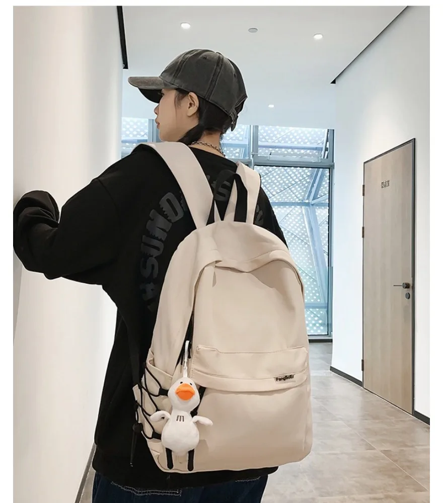 

Backpack female Japanese junior high school student college student cross-border lightweight waterproof schoolbag male backpack