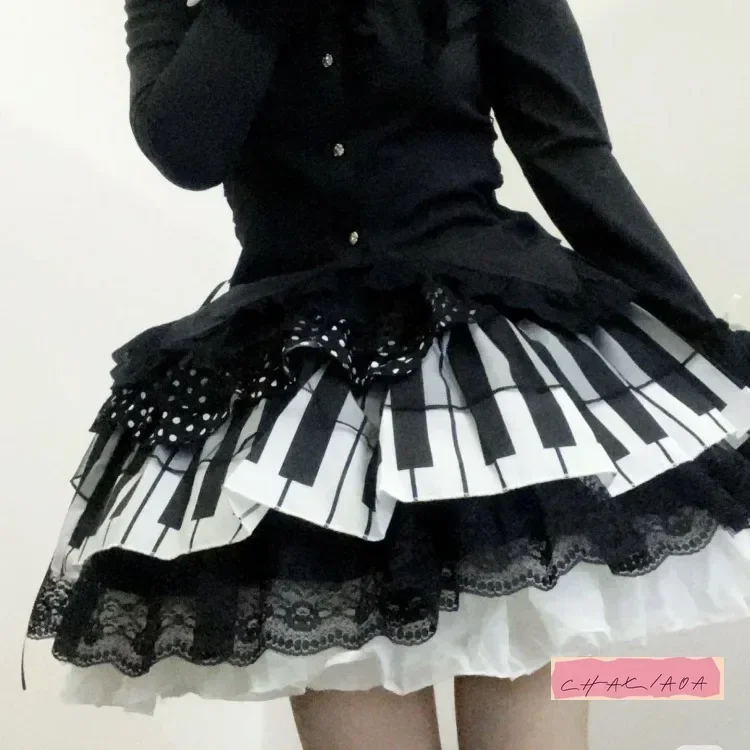 

Gothic Lolita White Black Sweet Piano Keys Polka Dot Lace Skirt Harajuku Y2K Commuter Flounder Keys Adjustable Waist Mini Skirt
