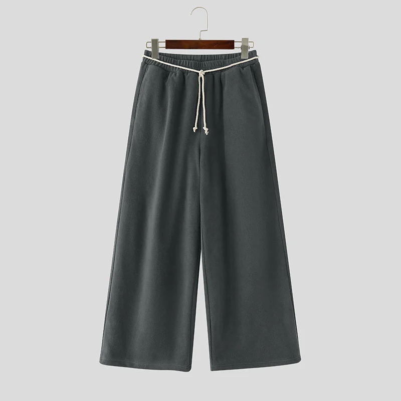 

INCERUN Men Pants Solid Color Elastic Waist Joggers Lace Up Trousers Men Streetwear Loose Fashion Casual Wide Leg Pants S-5XL