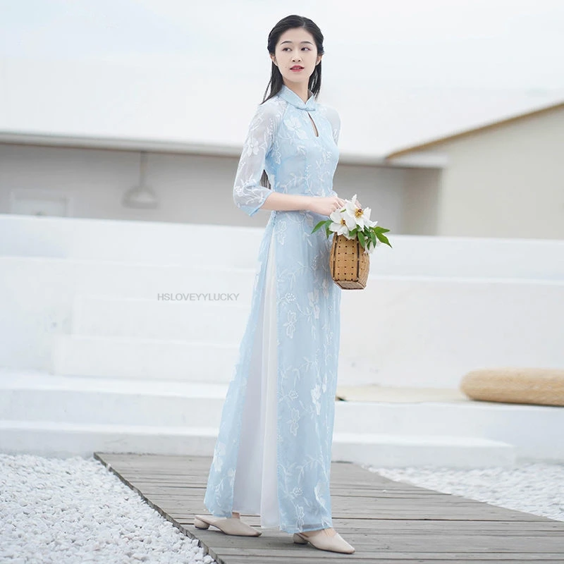 ملابس السنة الصينية التقليدية الجديدة للمرأة فستان شيونغسام التطريز خمر الإناث تشيباو الشرقية فيتنام أوداي فستان