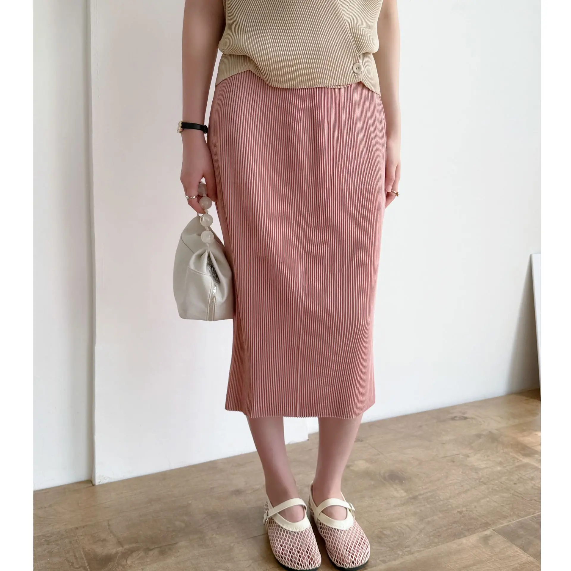 Miyake Pieghettato Nuovo 2025 Autunno e Primavera Moda High-end Abiti A Pieghe Temperamento Pendolarismo Pacchetto Hip Gonna a Mezzo Corpo