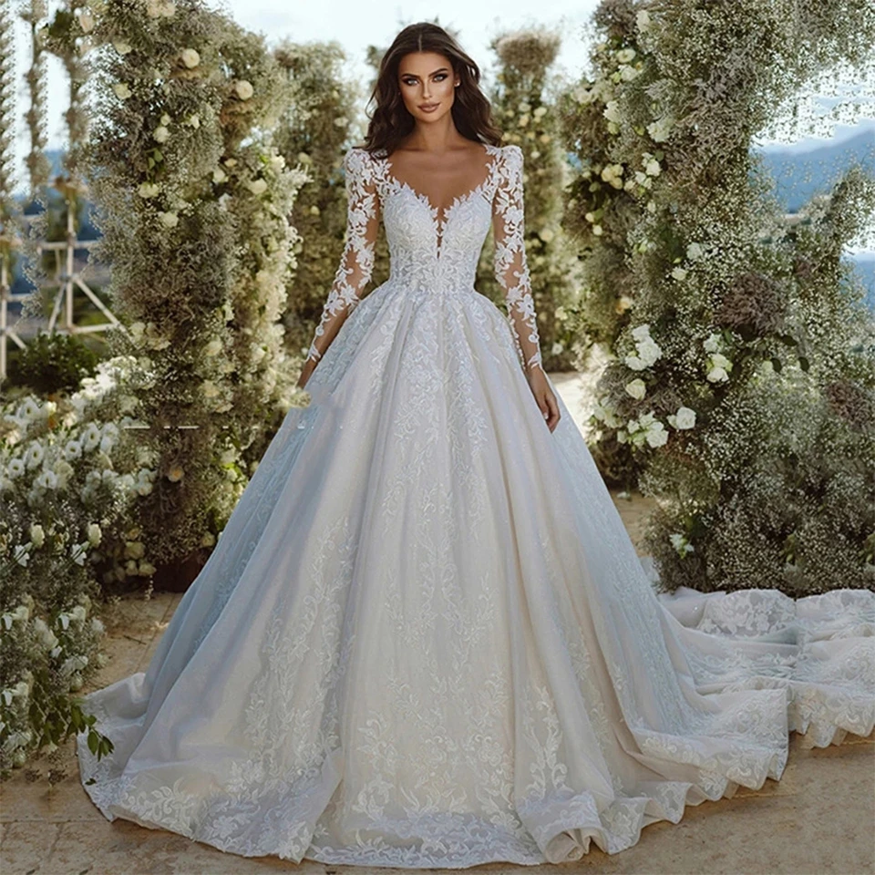 

Gorgeous Illusion Neck Long Sleeves Wedding Dresses 2023 A Line Lace Applique Court Train Glitter Tulle Buttons Back Bridal Gown