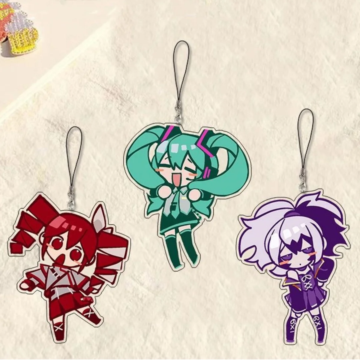 

Hatsune Miku accent teto peripheral mobile phone chain car keychain anime acrylic pendant doll toys girl halloween gift