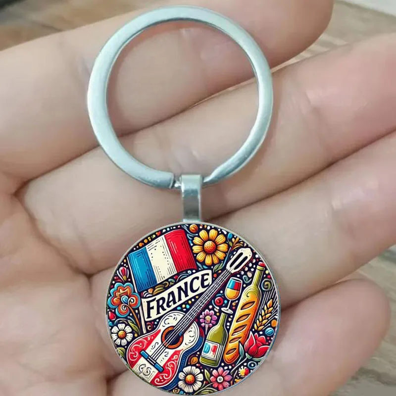 Llavero con bandera francesa de estilo francés, guitarra, vino, pan y otros elementos, el hogar del viajero es un regalo único para la cultura francesa