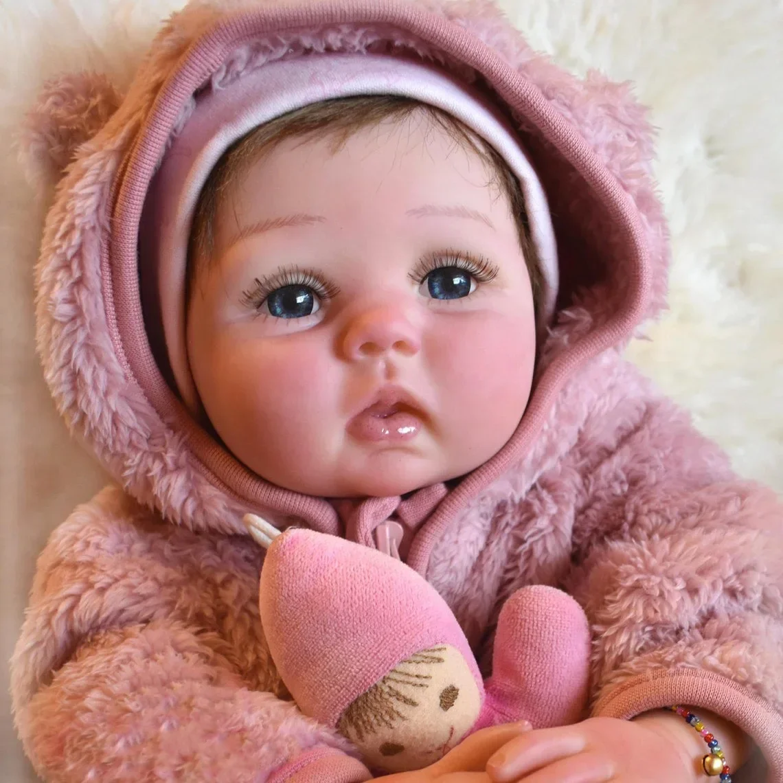 

NPK 55CM Reborn Baby Lucy Cute Face Cute Baby Girl Doll Lifelike Soft Touch Cuddly Toddler Girl Christmas Gift