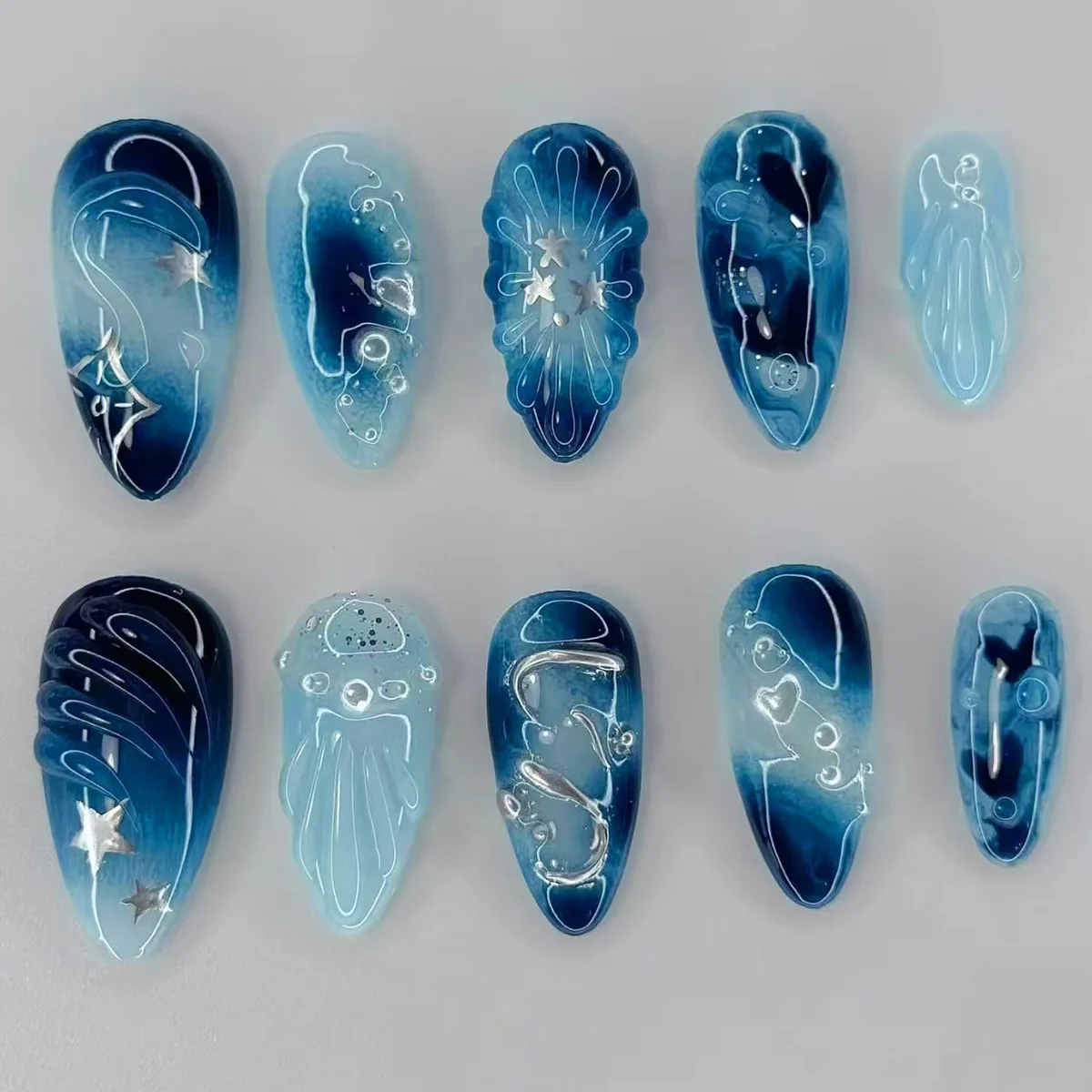 

24Pcs Mid-length Almond Press on Fake Nails 3D Ripple Heart Pearl Star False Nails Blue Smudge Detachable Full Cover Nails 2030