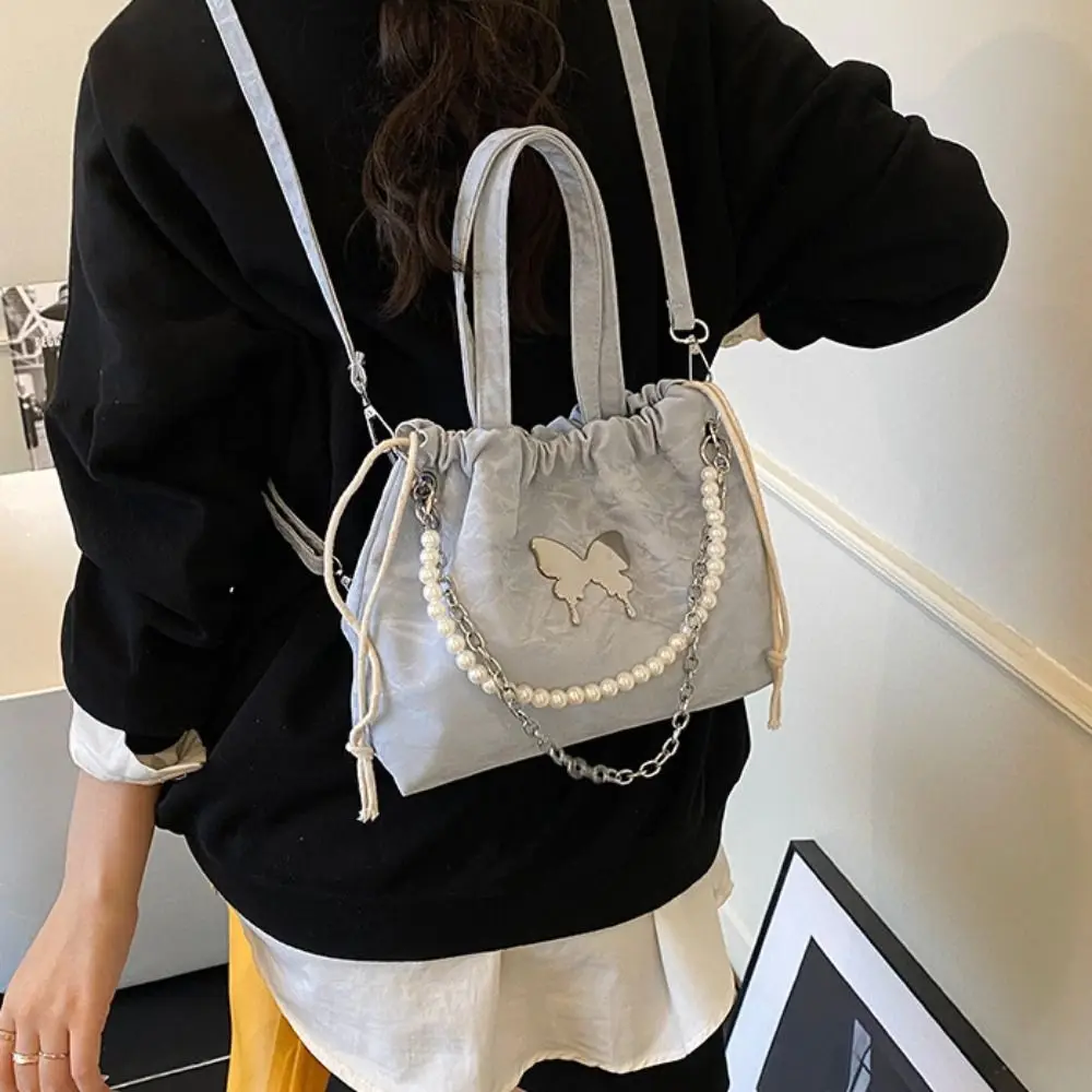 

Magnetic Buckle Silver Butterfly Backpack Butterfly Decor Pearls Chain Drawstring Shoulder Bag Large Capacity Versatile