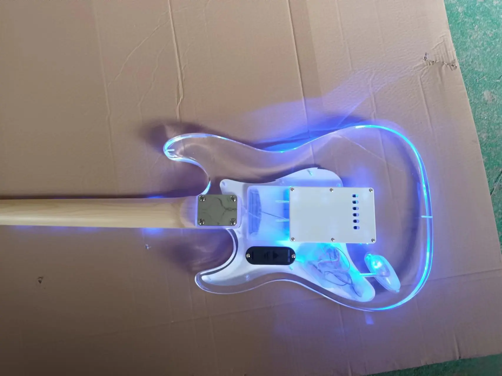 Acrylic electric guitar with blue lights, maple fretboard, high quality and customizable free shipping