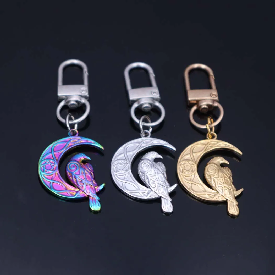 New fashionable stainless steel moon and bird pendant keychain accessory for men and women's bags, car keychains, non-fading pen