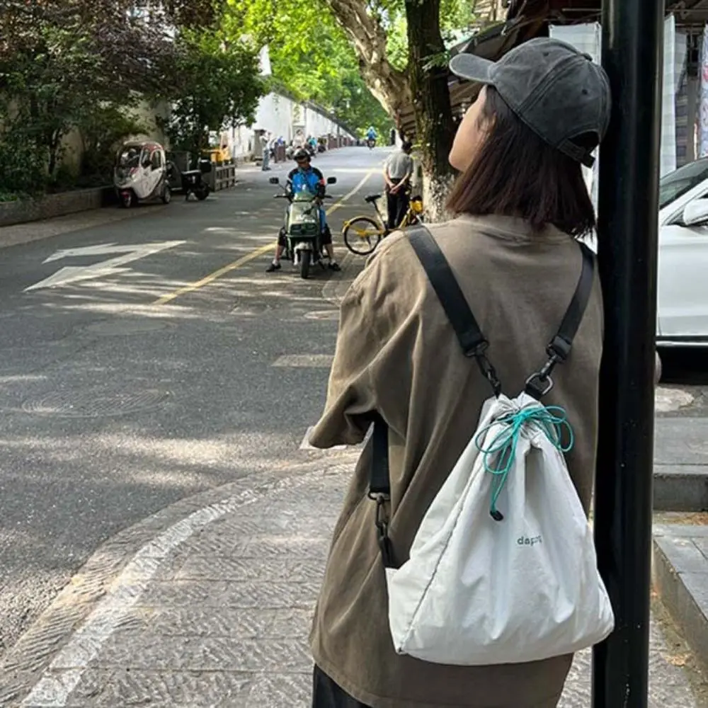 

Korean Style Drawstring Backpacks Large Capacity Niche Design Sport Nylon Bag Solid Color Tote Bag Shoulder Bag Outdoor
