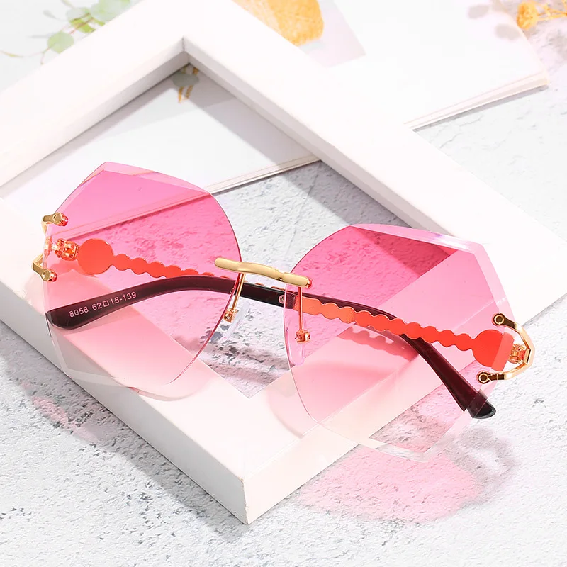 

Women's Sunglasses Fashion Sunglasses Pearl Inlaid Special Frameless Sun-Shade Glasses