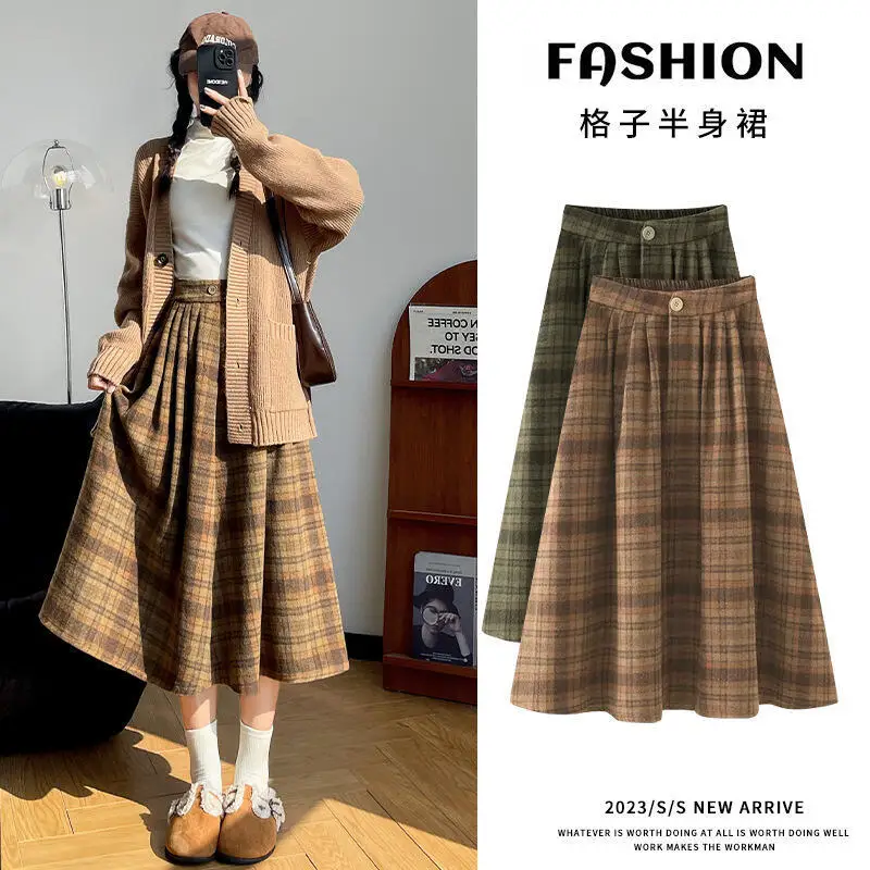 

Autumn Winter Girl Grid Skirt Shorty Temperament Woolen Fabric Umbrella Skirt Female High Waist Retro A-Line Skirt Wholesale