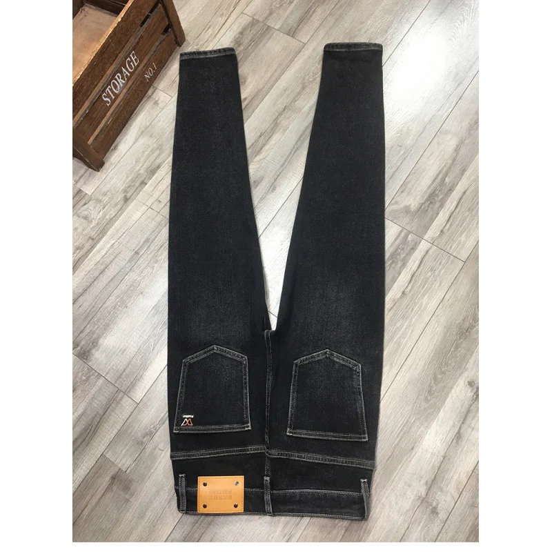 جينز صوف دافئ عالي الجودة للرجال 2025 شتاء جديد عصري ومريح ومتعدد الاستخدامات سروال تنحيف مرن #1