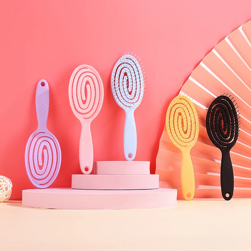 

Щетка для волос с отверстиями, с защитой от закручивания