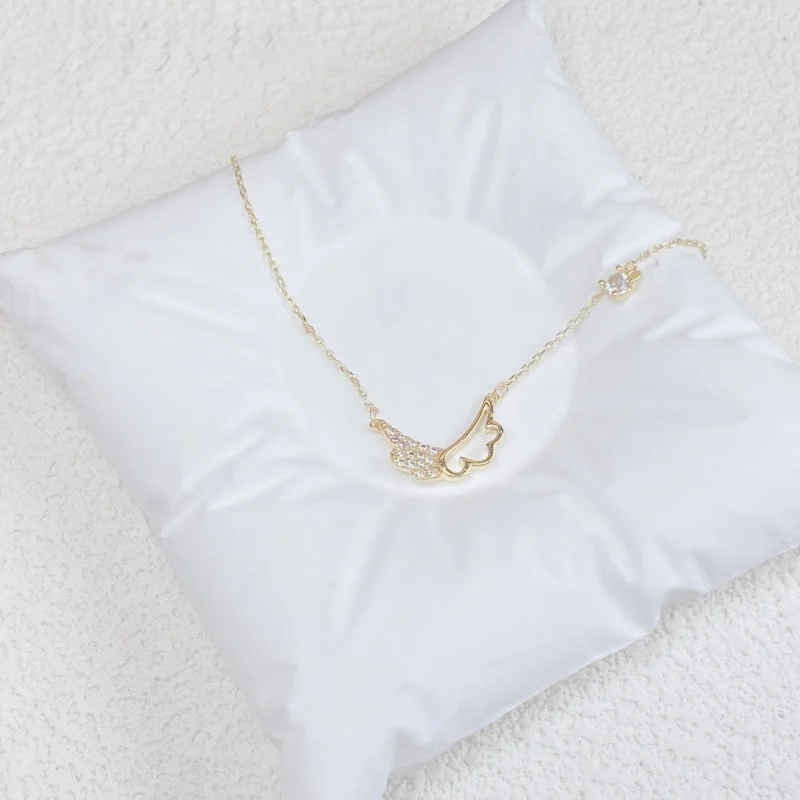 

Wings of Grace: Sparkling Angel Pendant Necklace