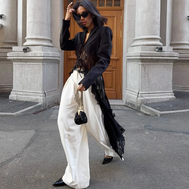 سترة نسائية من الدانتيل باللون الأسود من Talenza سترة نسائية طويلة مفرغة من الدانتيل مُزينة بقطع القماش ورباط علوي سترة نسائية مثيرة للحفلات