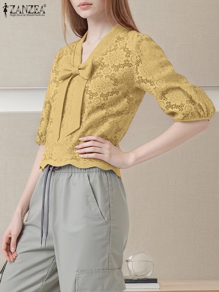 เสื้อแฟชั่น ZANZEA 2025 เสื้อผู้หญิงหรูหรา แต่งลูกไม้ คอวีผูกโบว์ เสื้อทำงานสำหรับสุภาพสตรี แขนพอง 3/4 สไตล์ลำลอง เสื้อเบลาส์