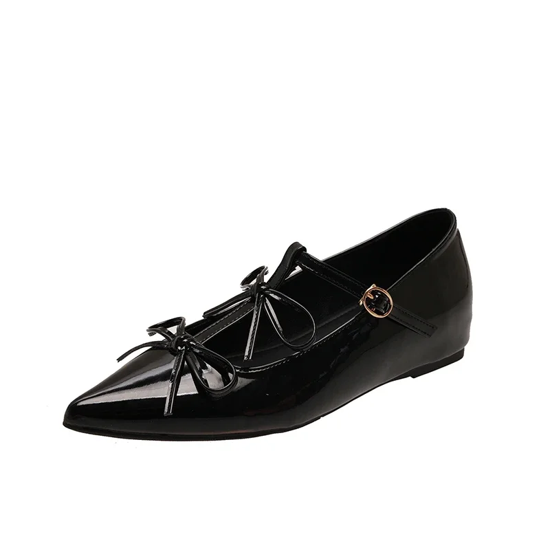 أحذية نسائية ماركة 2025 بحزام بإبزيم أحذية نسائية مسطحة على الموضة بعقدة على شكل فراشة جديدة صلبة أفضل بائع أحذية ماري جين بمقدمة مدببة مثيرة