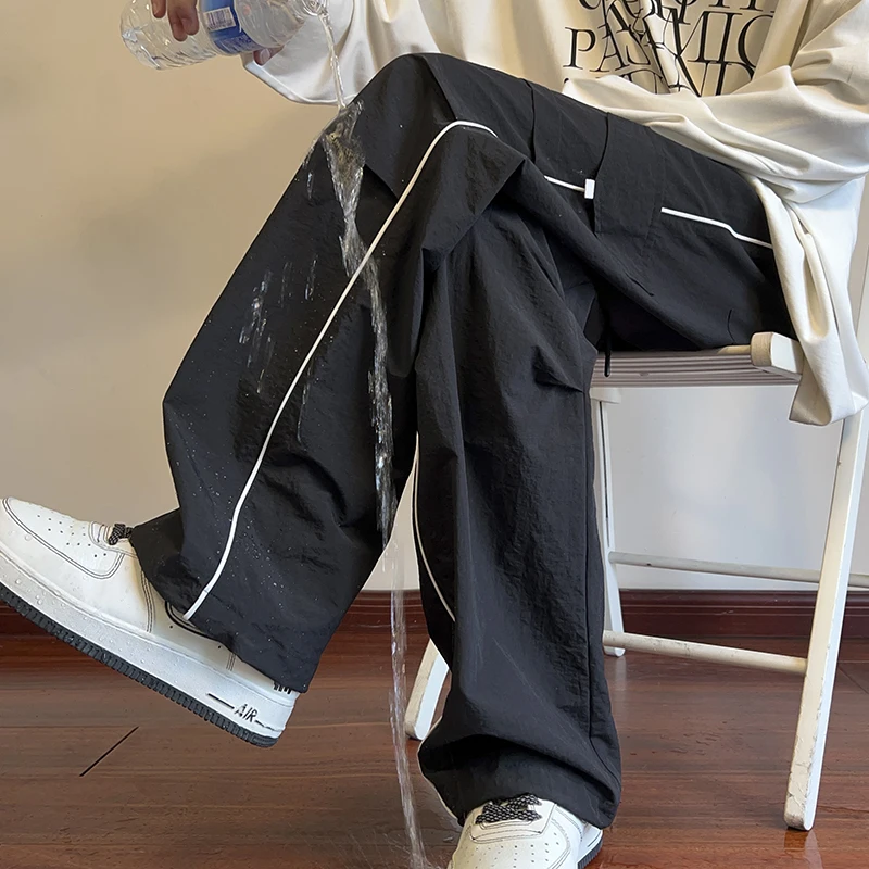 

2024 Mens Joggers Spring Casual Loose Staight Sweatpants Elastic Waist Waterproof Trousers Hip Hop Casual Unisex Pants