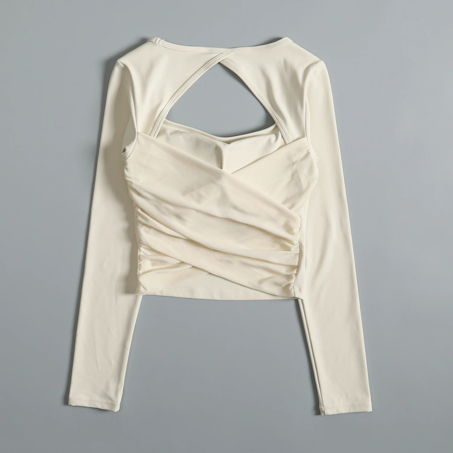 Yogakleding met holle rug, dames herfst alles-in-één hardlooptrainingtop met lange mouwen, modieuze afslankende sport-fitnesskleding