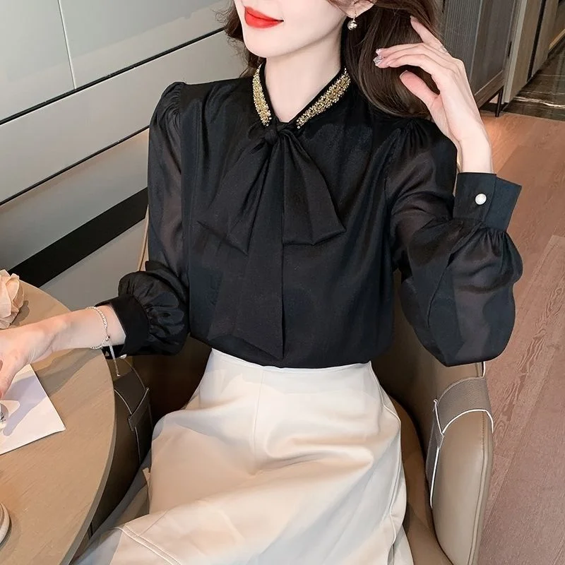 بلوفر نسائي جديد مخيط موديل 2025 بفيونكة موضة بلون سادة قمصان فضفاضة متعددة الاستخدامات غير رسمية بأكمام طويلة