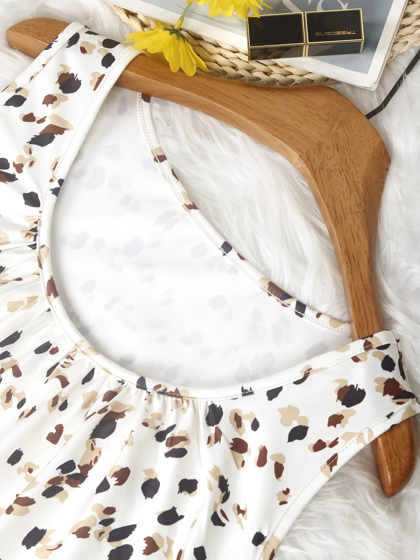 Erweitern Sie Ihre Sommergarderobe mit diesem ärmellosen Damen-Tunika-Oberteil in Übergröße und mit einem schicken Leopardenmuster. Perfekt