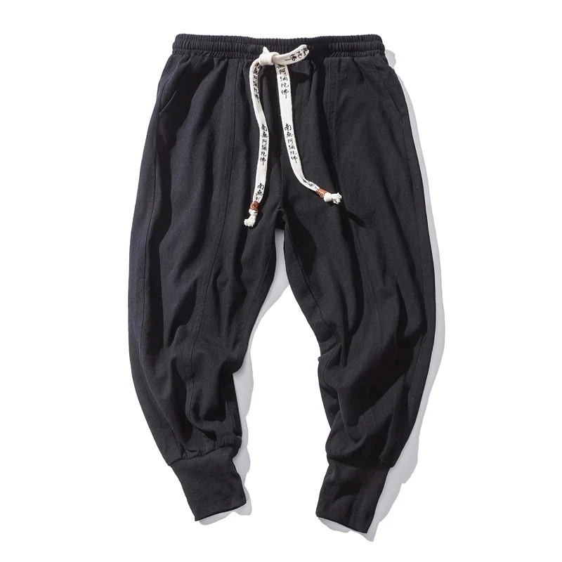 Pantaloni stile harem in cotone e lino da uomo tinta unita elastico in vita streetwear pantaloni nuovi pantaloni larghi con cavallo basso pantaloni casual da uomo
