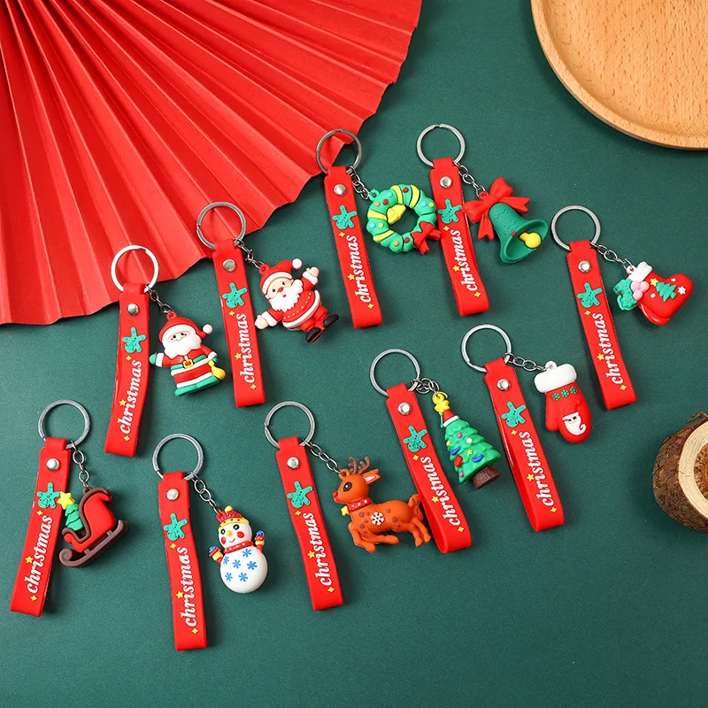 Christmas small gifts cartoon keychain pendant PVC soft rubber doll snowman old man schoolbag pendant accessories Leather rope