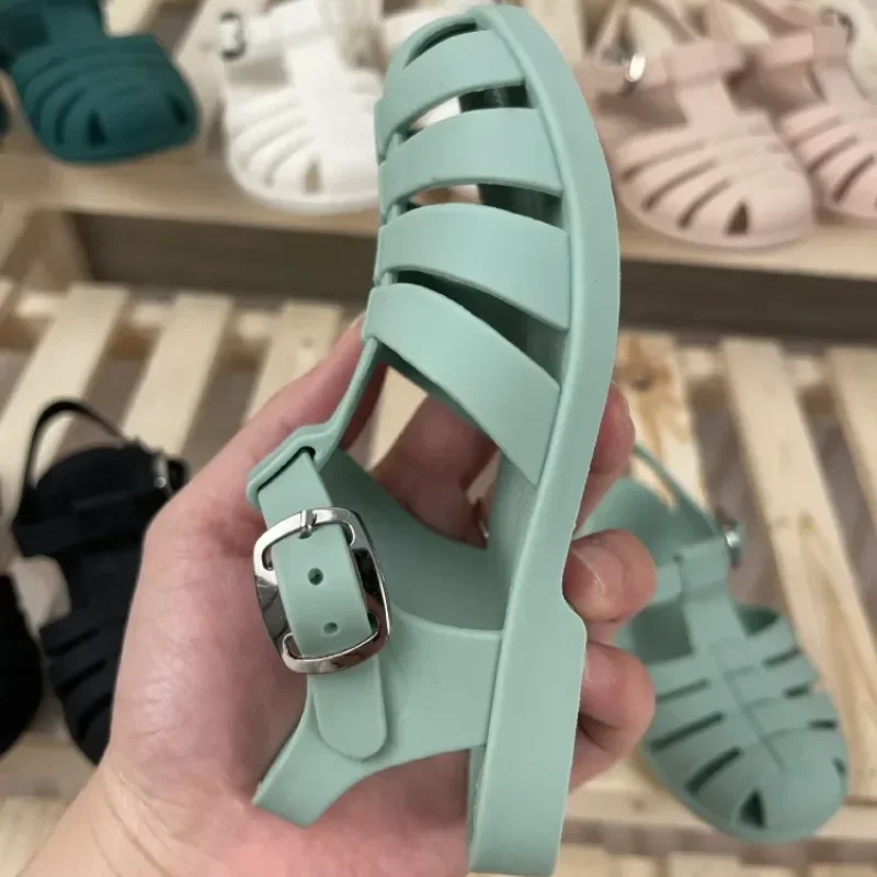 Sandalias romanas con hebilla de Metal para bebé, zapatos de playa de gelatina de caramelo, zapatillas de princesa huecas, Verano