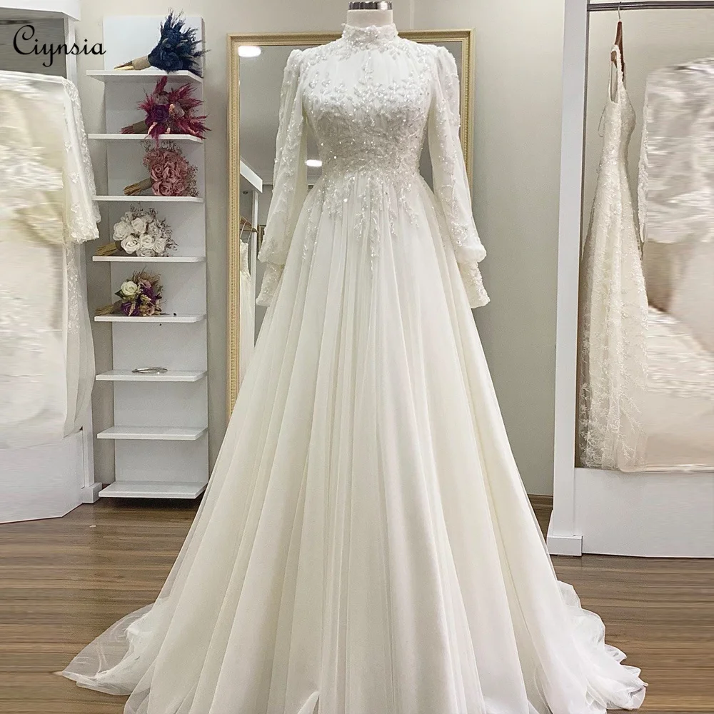 

Ciynsia Elegant Lace Beaded Ivory Wedding Dresses Long Sleeves A-Line Tulle Bridal Gown Sweep Train Muslim Robe De Mariee 2024