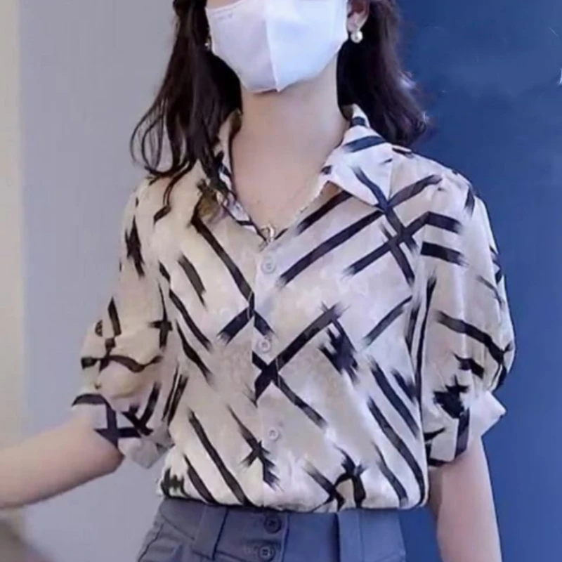 2024 New Korean Commuter Minimalist Fashion Loose Short Sleeved Blouses Polo Collar Printed Stripe Button Women\'s Shirt Top