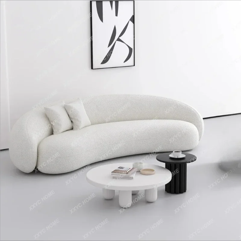 A Minimalist curved sofa small apartment living room creative leisure