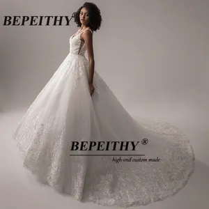 Bepeithy Custom Deep Ausschnitt in V Spitzen Hochzeitskleid 2025 für Frauen Indische Braut Prinzessin Elfenbein Bouquet ohne Ärmel 12 Hauptverkaufsbrautkleider von Arabes - №2