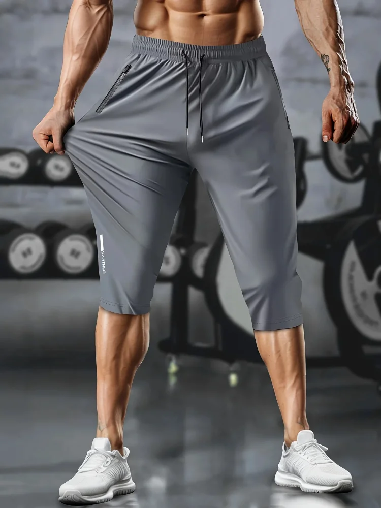1 Stück leichte, sportliche, verkürzte Herrenhose mit Kordelzug, Reißverschlusstaschen und reflektierenden Streifen – atmungsaktives, schnell trocknendes Material – Detail 10