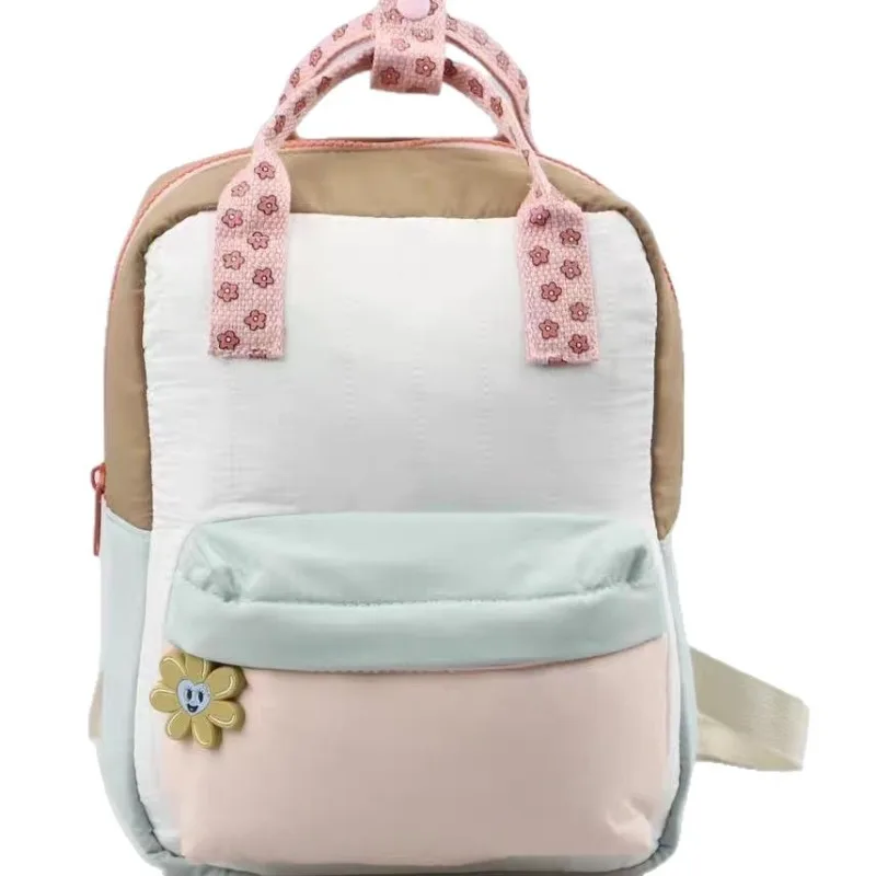 حقيبة ظهر جديدة خفيفة الوزن للأطفال مع سحر عباد الشمس المرح وتصميم كتلة الألوان للنزهات.