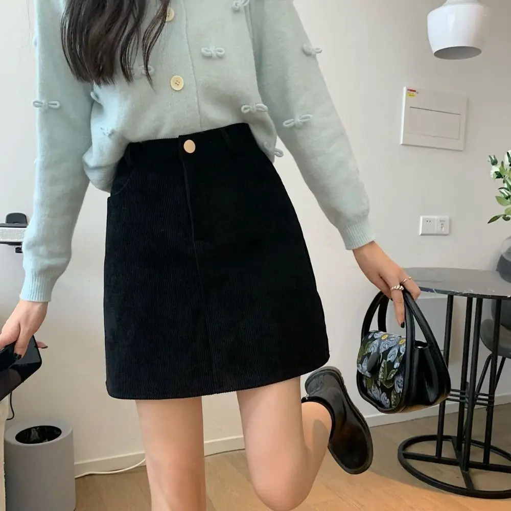 Falda de pana de cintura alta para mujer, Falda corta acampanada de terciopelo estilo chica picante, falda ajustada de talla grande para Otoño e Invierno para mujer