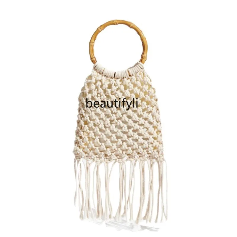 

Hollow design cotton rope hand-woven handbag round handle handle fringed bag hand carry beach bag