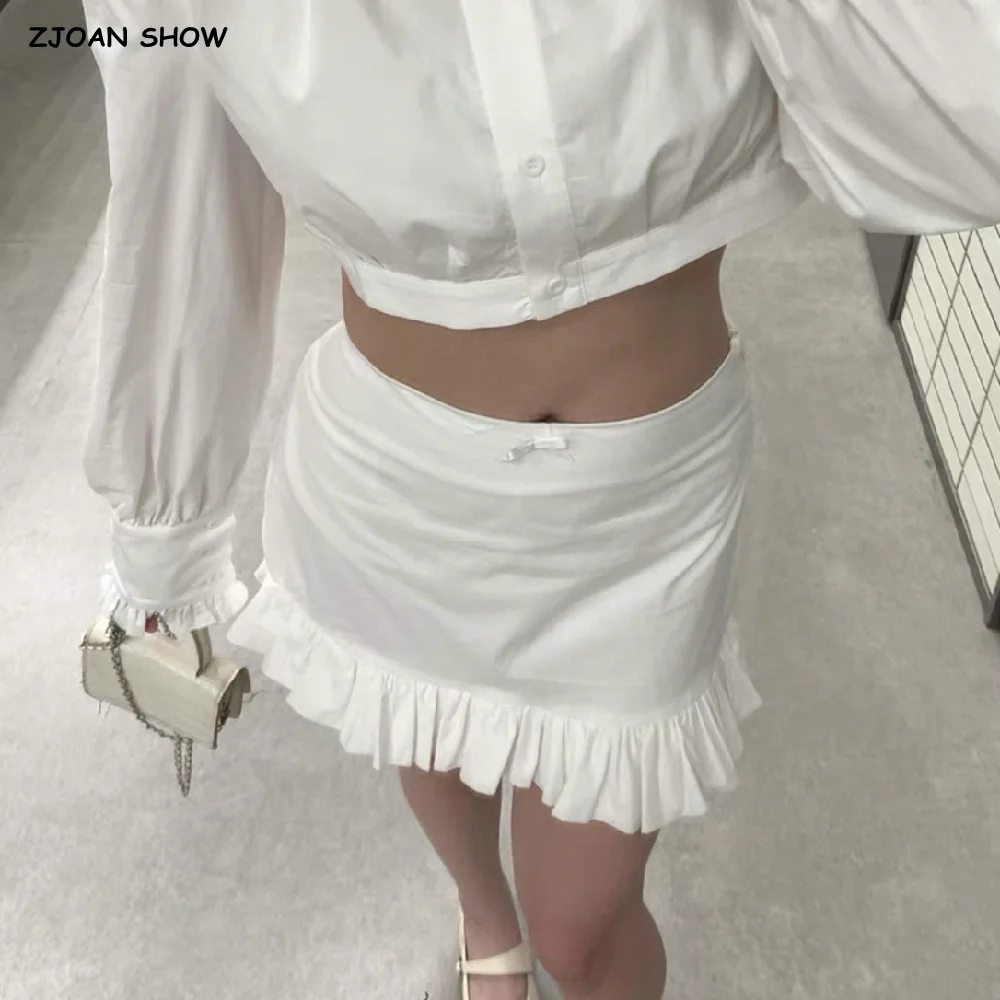 Nuovo 2025 CHIC pacchetto bianco fianchi impiombati volant orlo cerniera vita bassa minigonna sexy gonne corte a pieghe con pantaloncini fodera